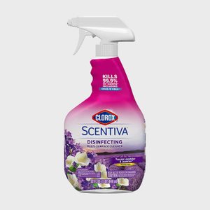 Spray bottle labeled Clorox Scentiva disinfecting cleaner. Purple background with lavender and jasmine imagery, highlighting germ-killing properties against COVID-19.