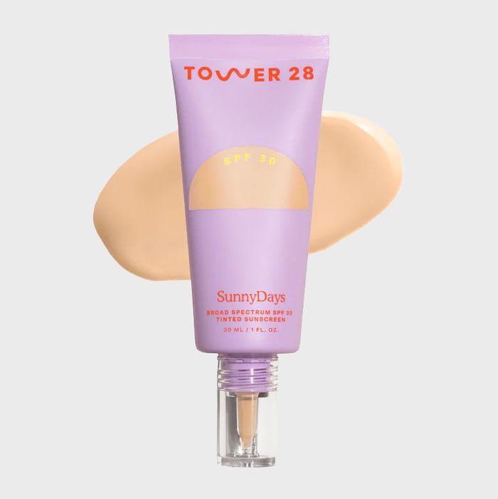 Purple sunscreen tube, labeled 
