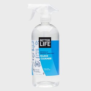 A clear spray bottle labeled 