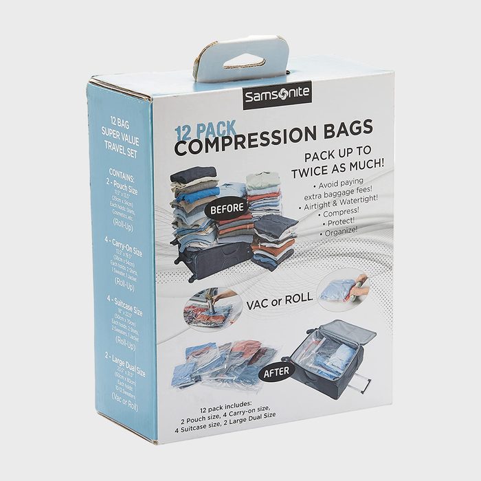 Box showcases compression bags packing clothes neatly, maximizing space. Blue and white theme with text detailing contents and benefits for travel efficiency.