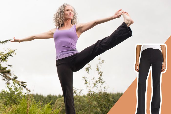 Person balances on one leg, stretching in a yoga pose, outdoors with greenery. Inset shows black pants worn.