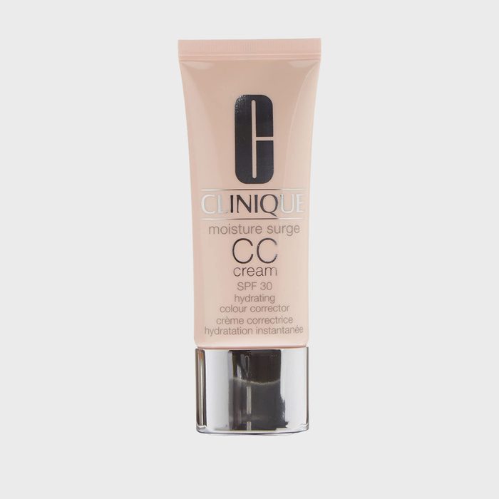 A tube of Clinique moisture surge CC cream, labeled SPF 30 hydrating color corrector, stands against a plain white background.