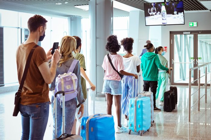 Travelers Waiting For Boarding At The Aiport