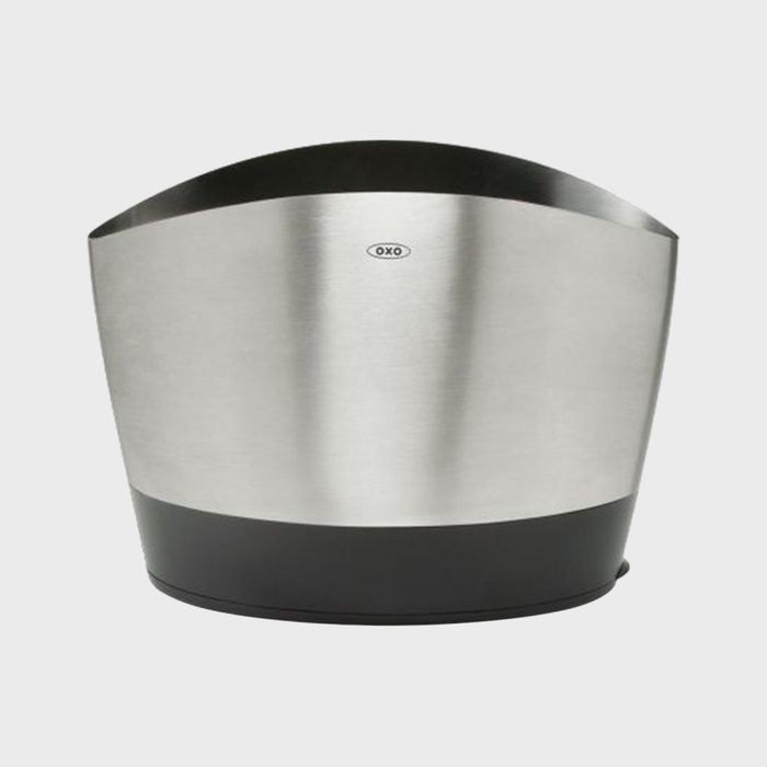 A stainless steel ice bucket sits on a flat surface, with the logo 