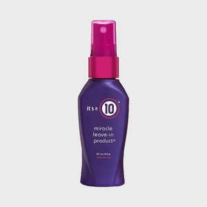 A purple spray bottle labeled 
