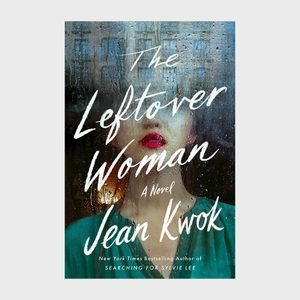 Cover shows a woman partially visible behind wet glass. Text reads: 