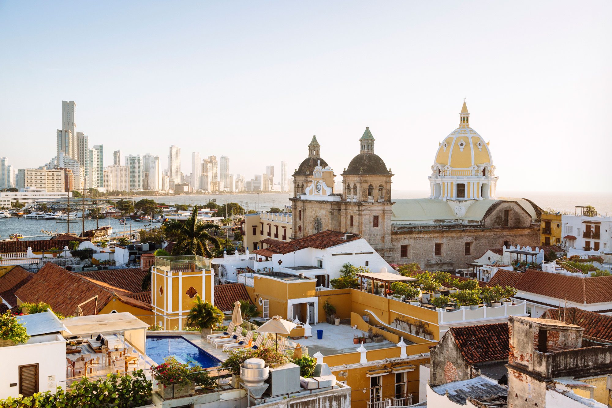 Skyline Of Cartagena With The Church Of San Pedro Claver And Monastery And The Modern Building Of Bocagrande In The Background Cartagena De Indias Colombia