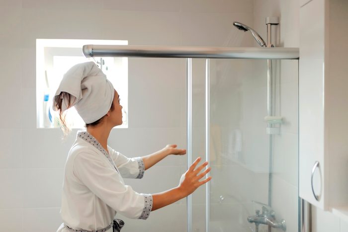 Woman Getting Ready to Shower