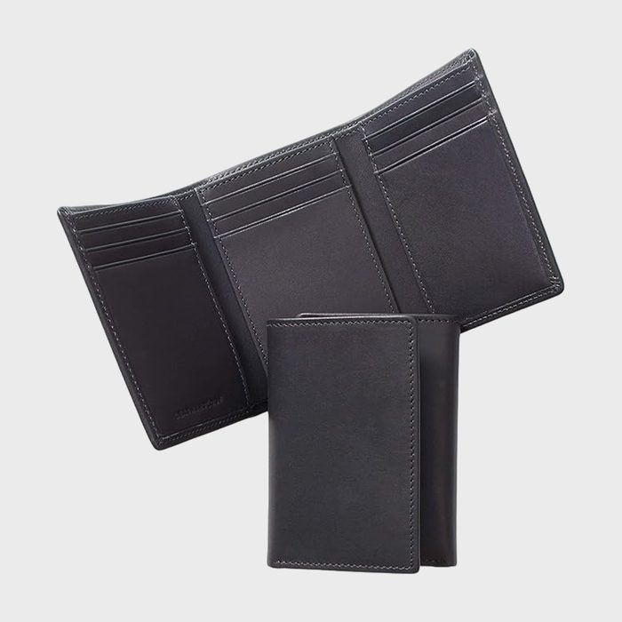 Black leather wallet open, displaying multiple card slots, on a plain white background.