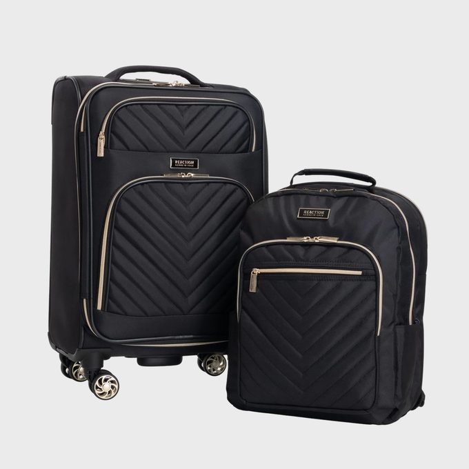 Two black quilted bags; one suitcase on wheels and a backpack. Both display 