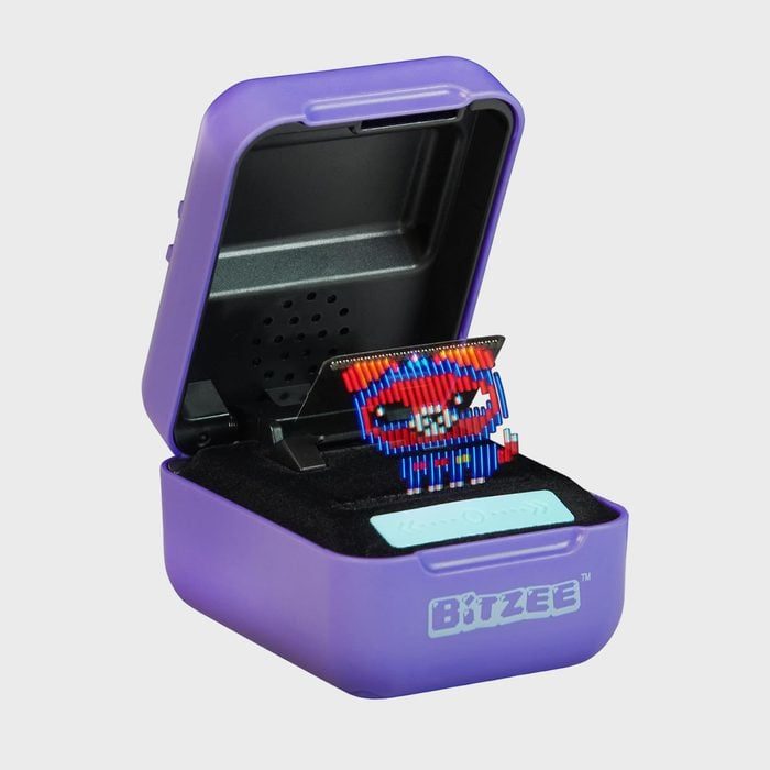 Purple box displays 3D figure opening its lid in a plain setting. Text reads 