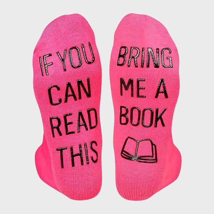 Pink socks display text reading 