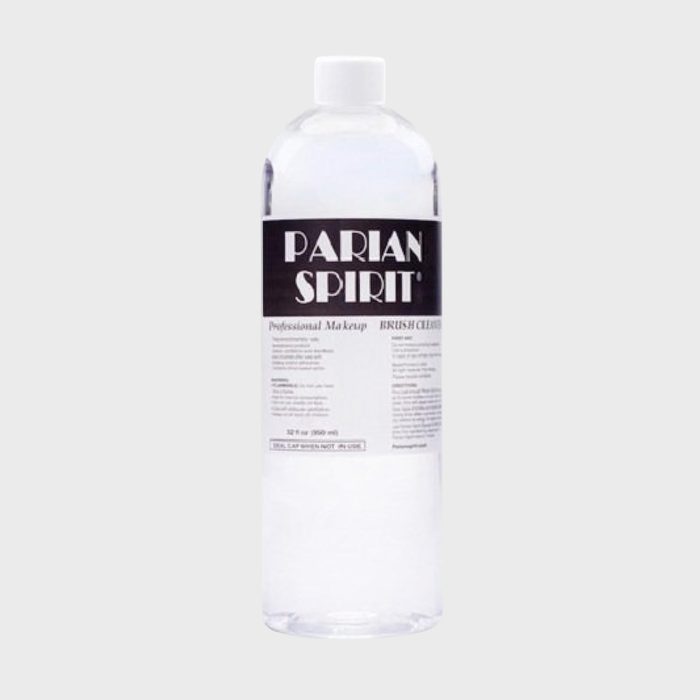 Bottle contains liquid, labeled 