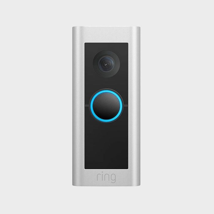 A rectangle doorbell with a camera and blue-lit button, labeled 