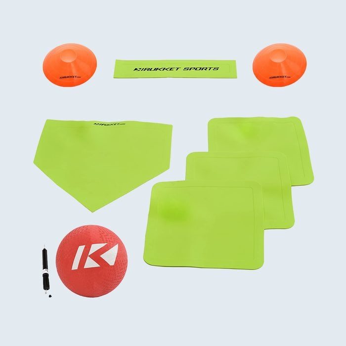 Sports equipment arranged; items include cones, base markers, a kickball, and a pump. All displayed on a light background with 