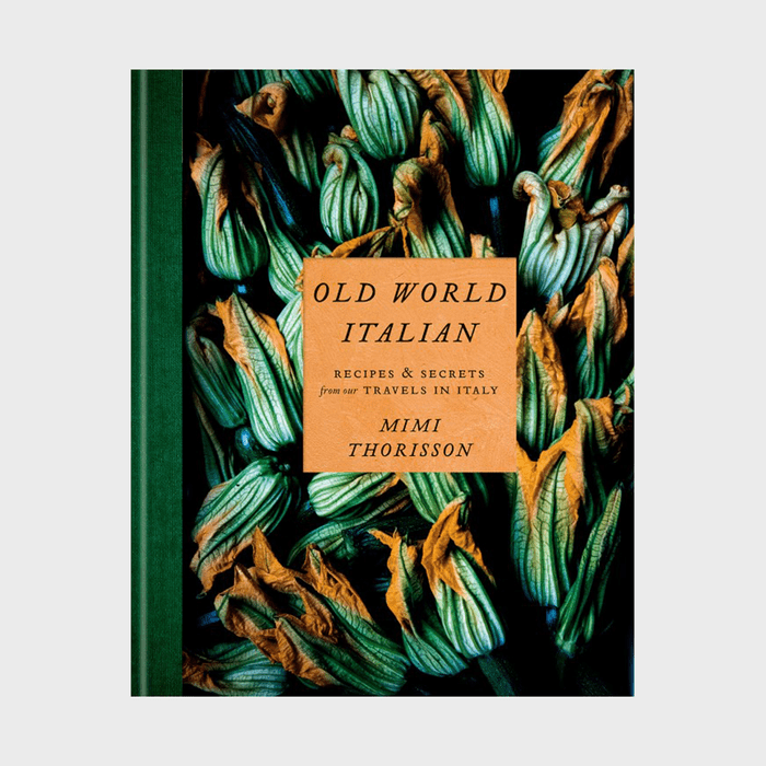 Book cover displays zucchini blossoms surrounding a label reading 