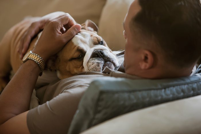 man with pet dog