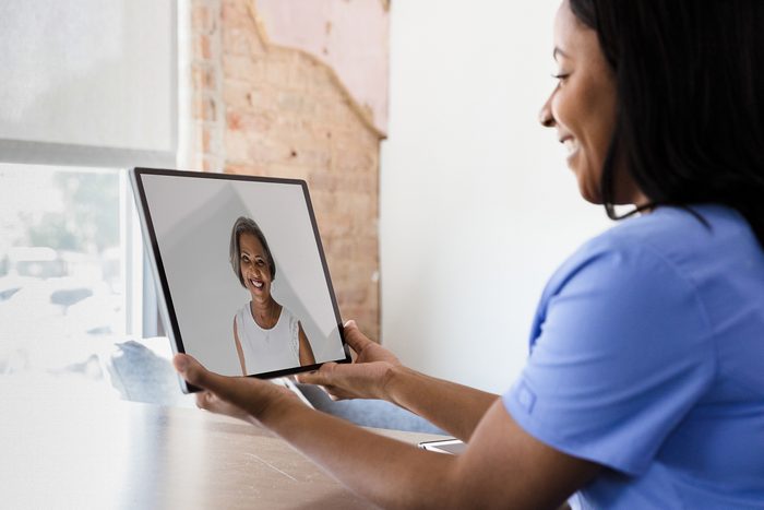 woman on zoom call with her mother