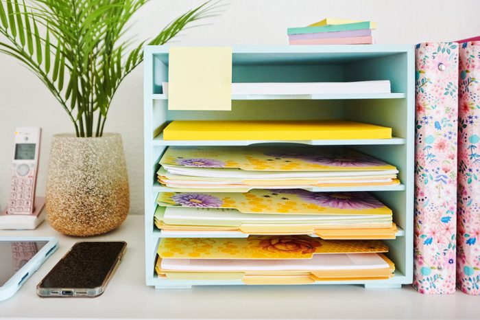 floral folders in a filing cabinet in a bright modern home office