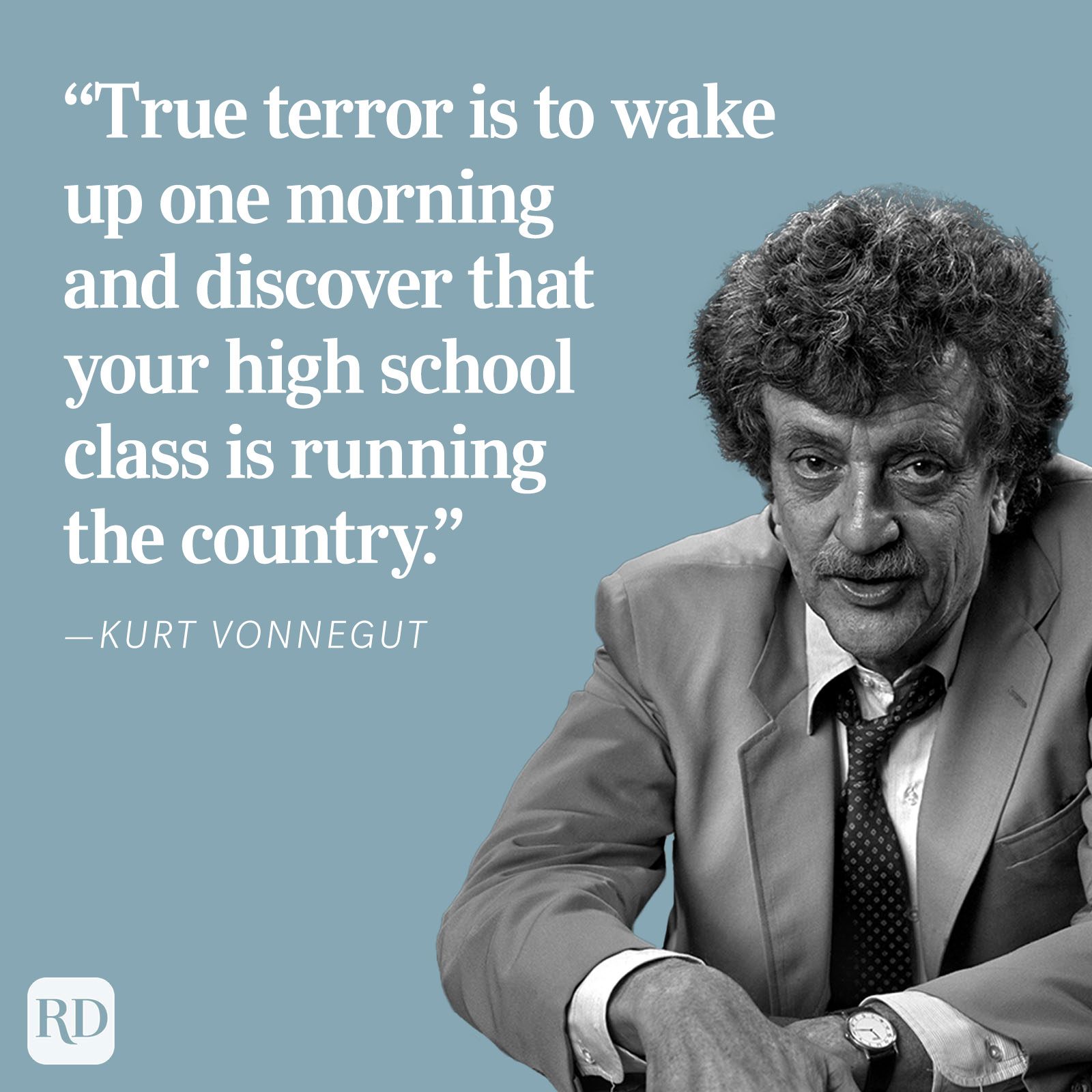 A man in a suit sits thoughtfully against a blue background featuring a quote by Kurt Vonnegut about high school classmates running the country.